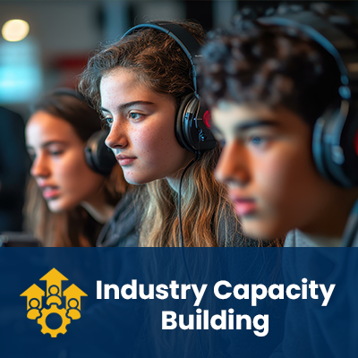 industry capacity building young people listening to headphones